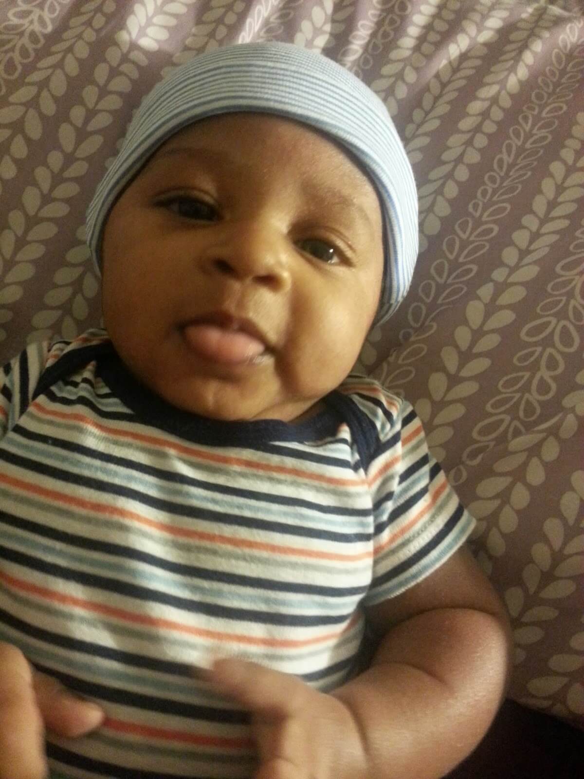child showing tongue